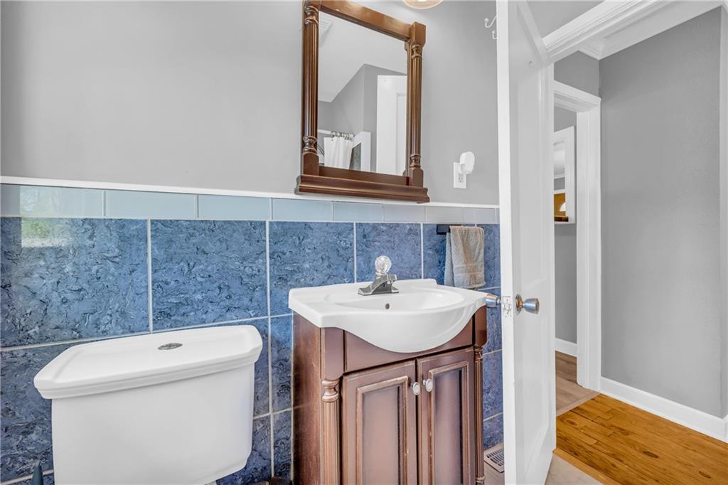 3351 Phillip Circle Decatur, GA 30032 - Photo 15 of 29 a bathroom with a sink a toilet and mirror