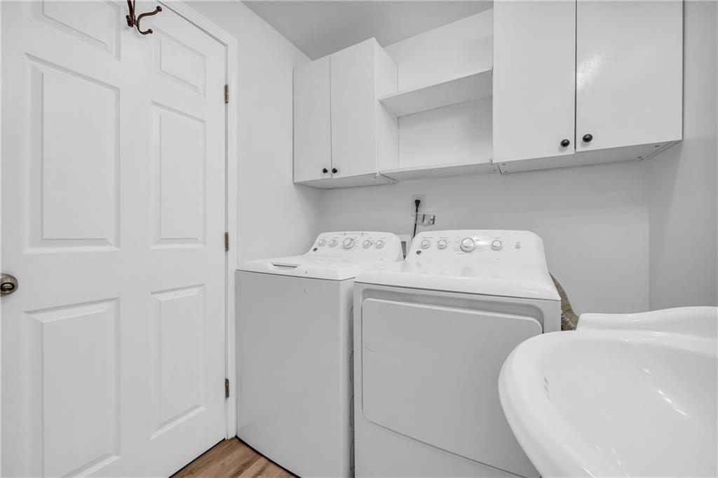 3351 Phillip Circle Decatur, GA 30032 - Photo 19 of 29 a utility room with dryer and washer