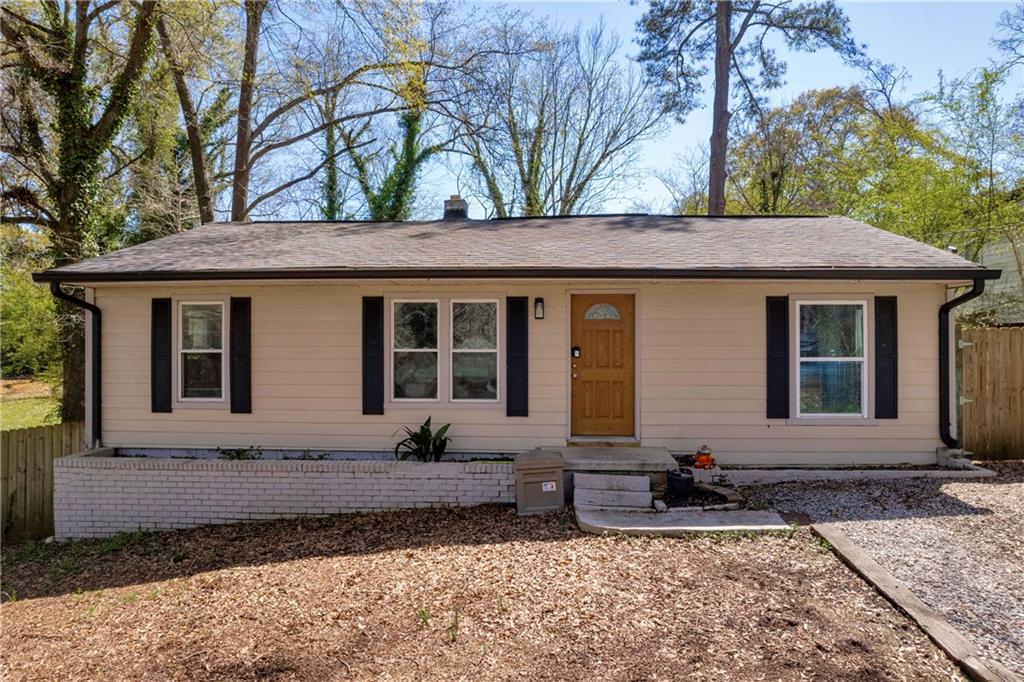 3351 Phillip Circle Decatur, GA 30032 - Photo 2 of 29 a front view of a house with garden
