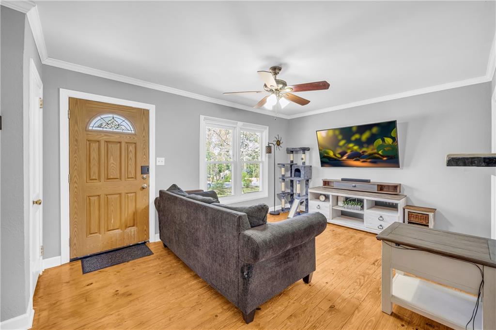 3351 Phillip Circle Decatur, GA 30032 - Photo 4 of 29 a living room with furniture and a flat screen tv