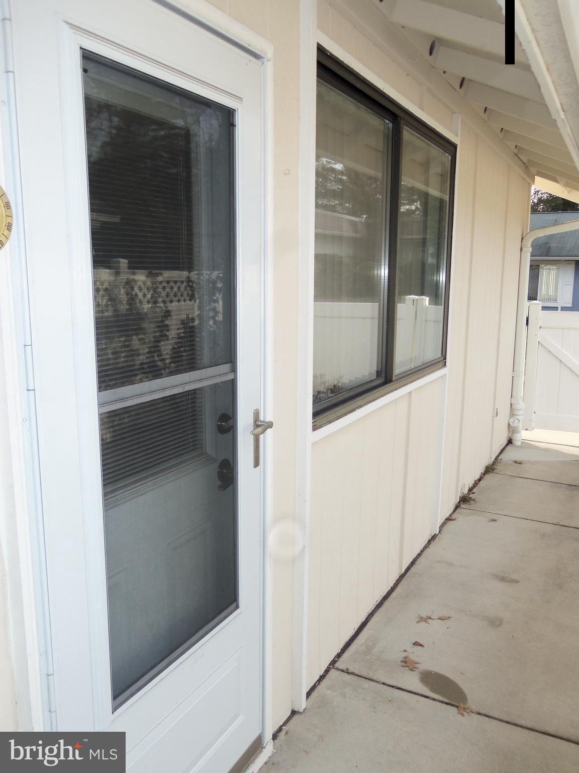 15217 Tottenham Terrace, Unit 27B Silver Spring, MD 20906 - Photo 11 of 46 Walkout from Den/office to fenced-in patio