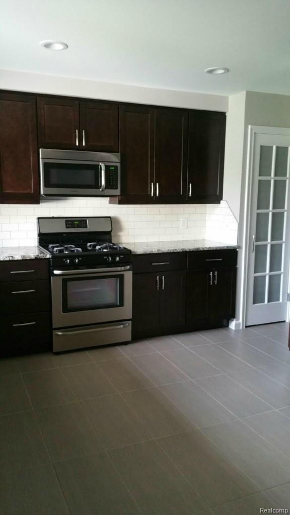 16235 East 14 Mile Road Fraser, MI 48026 - Photo 7 of 35 20150828_094516.jpg