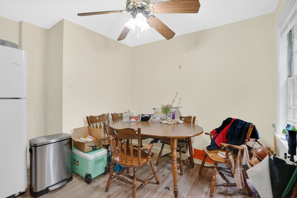 1440-1446 Carew Street Springfield, MA 01104 - Photo 18 of 26 a view of a dining room with furniture and chandelier
