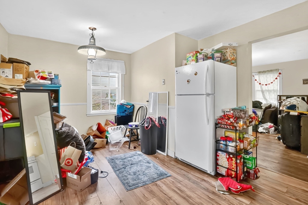 1440-1446 Carew Street Springfield, MA 01104 - Photo 22 of 26 a view of a workspace with furniture and toys