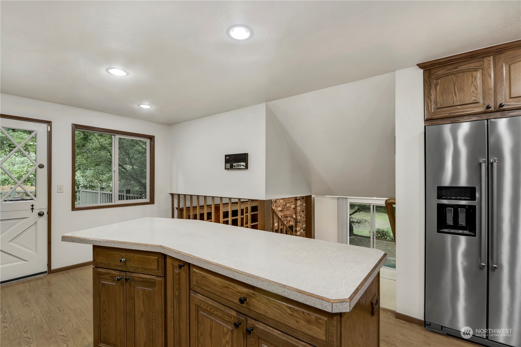 6120 Delphi Road Southwest Olympia, WA 98512 - Photo 13 of 40 a view of kitchen with furniture and refrigerator