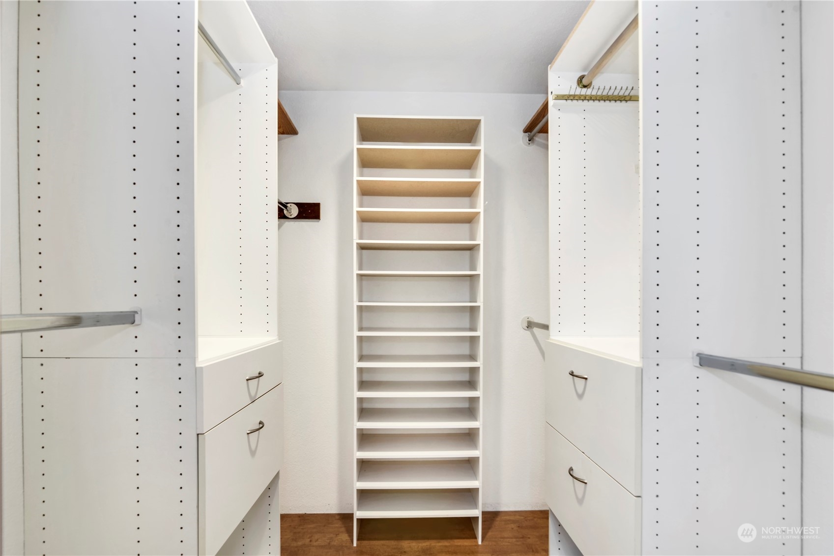 6120 Delphi Road Southwest Olympia, WA 98512 - Photo 19 of 40 a view of walk in closet with empty racks