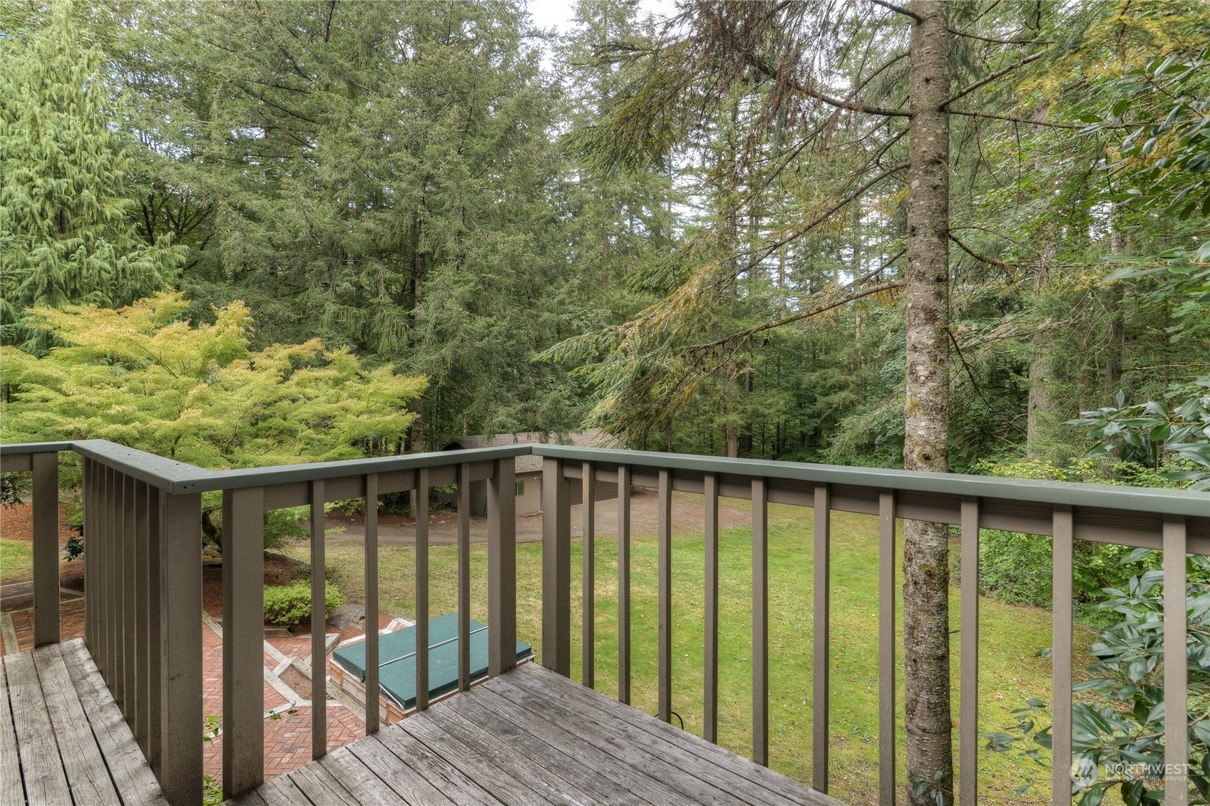 6120 Delphi Road Southwest Olympia, WA 98512 - Photo 20 of 40 a balcony with wooden floor and outdoor space