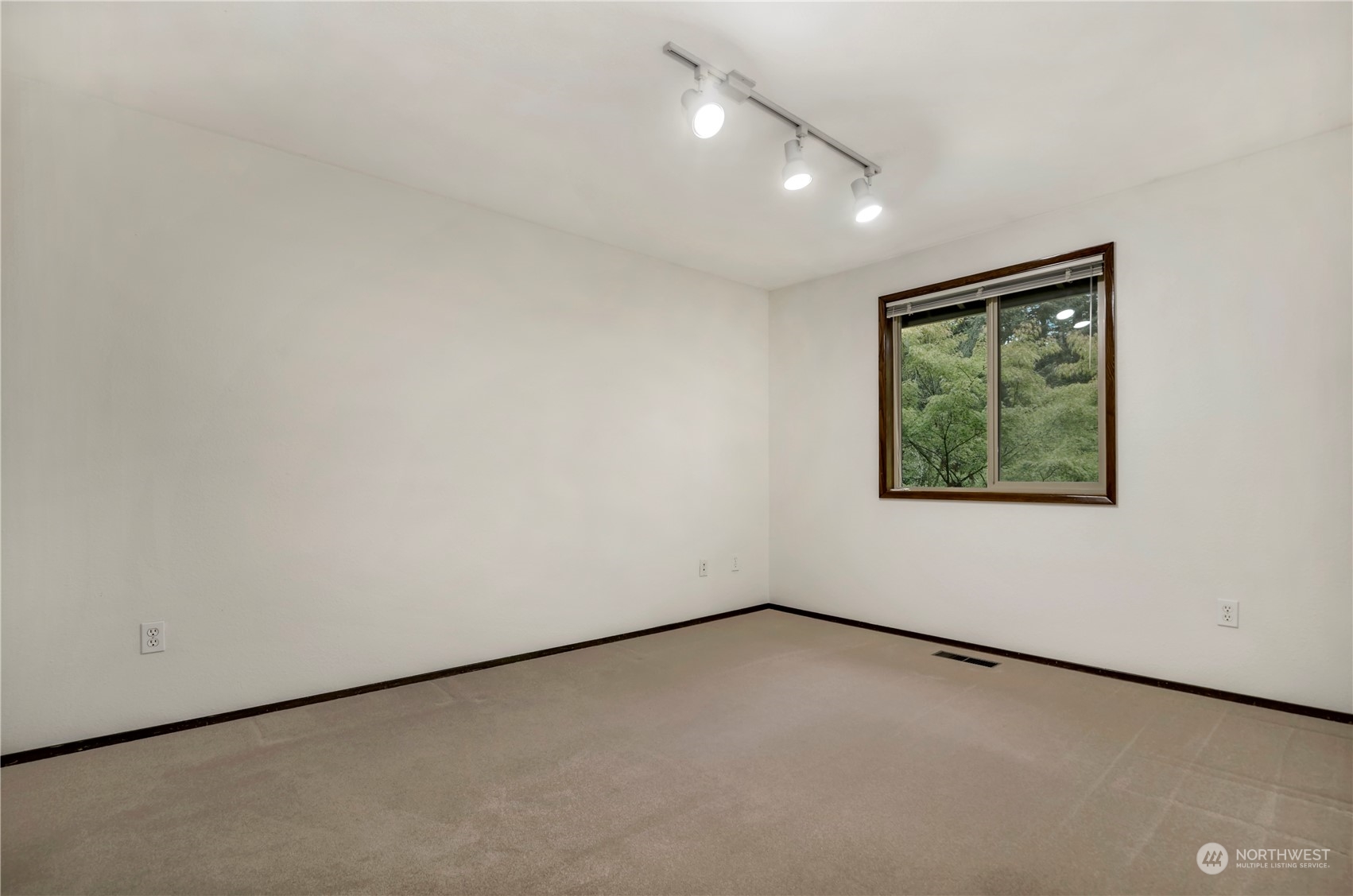 6120 Delphi Road Southwest Olympia, WA 98512 - Photo 21 of 40 an empty room with a window