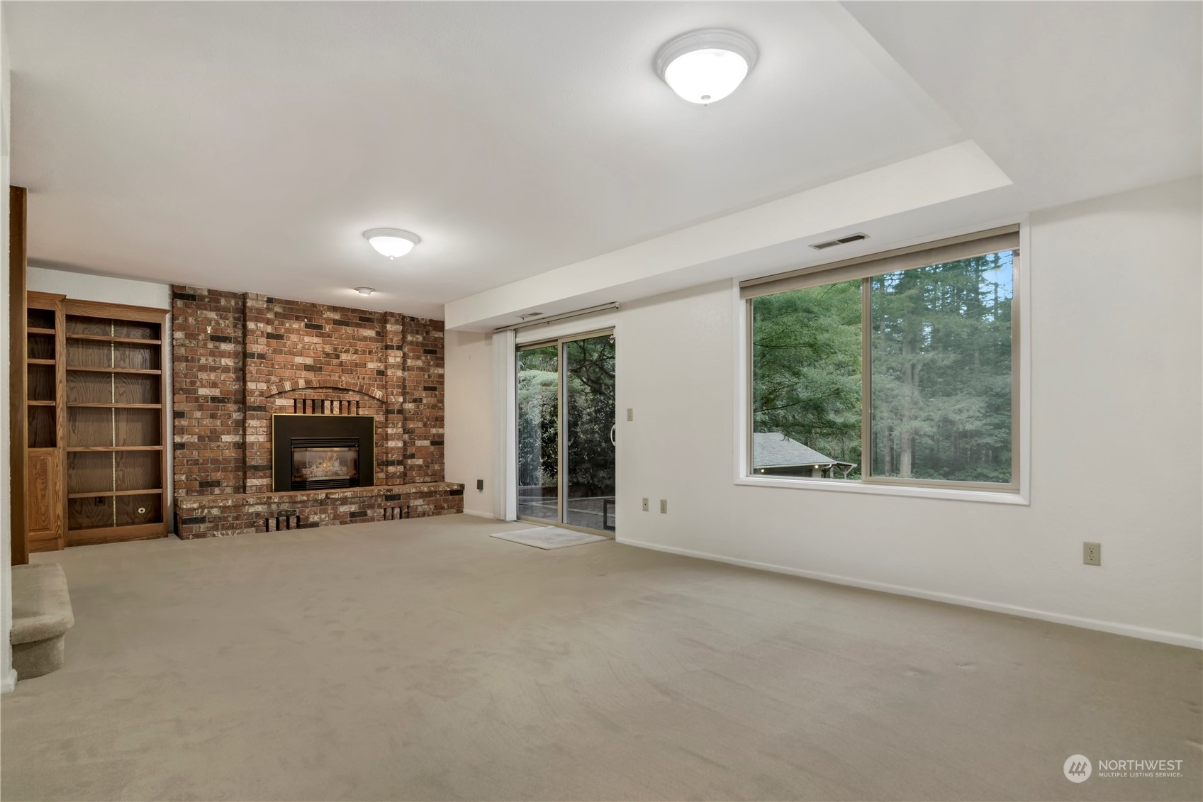 6120 Delphi Road Southwest Olympia, WA 98512 - Photo 25 of 40 an empty room with furniture and a large window