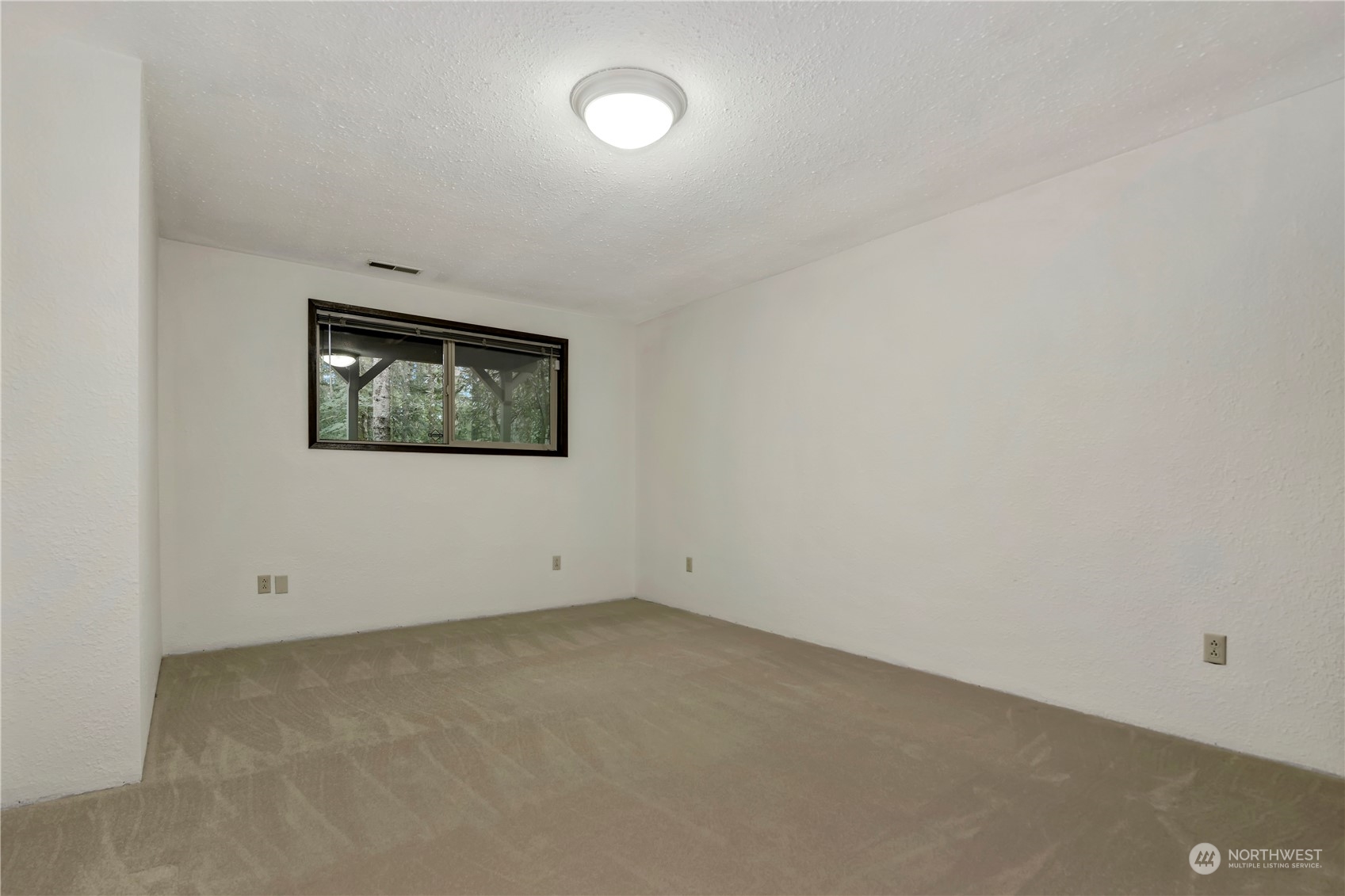 6120 Delphi Road Southwest Olympia, WA 98512 - Photo 27 of 40 an empty room with a window