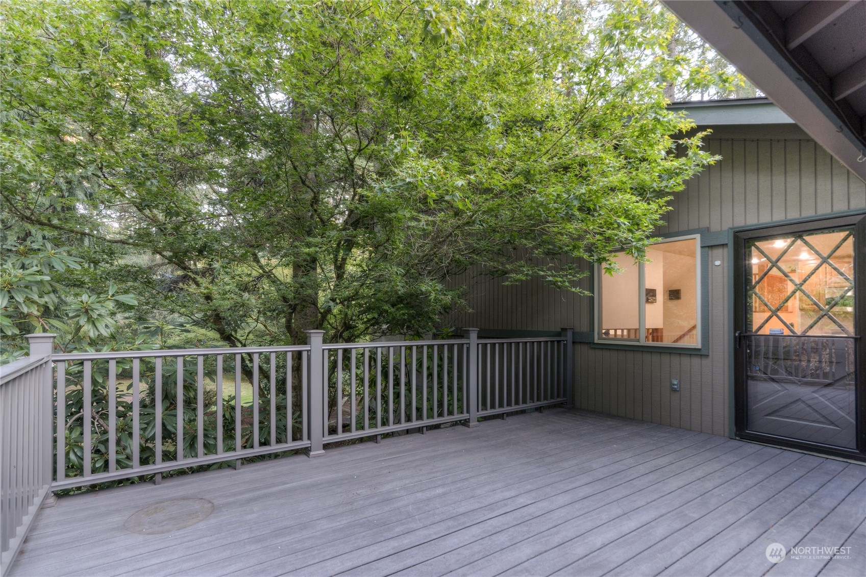 6120 Delphi Road Southwest Olympia, WA 98512 - Photo 34 of 40 a balcony with wooden floor and deck