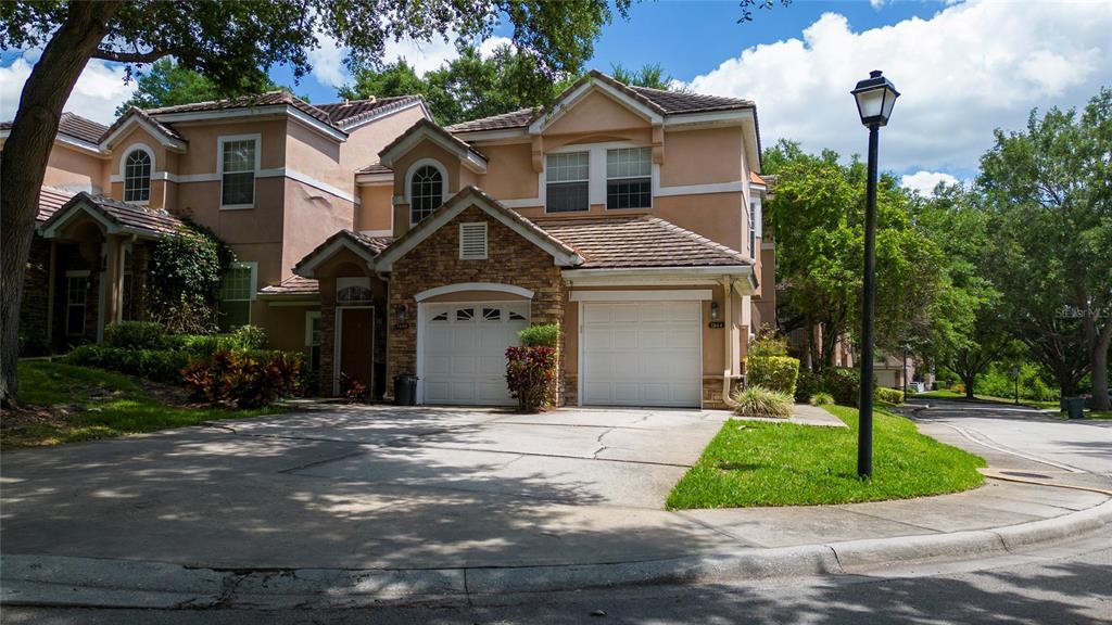 7544 Bayport Road, Unit 25 Orlando, FL 32819 - Photo 1 of 1 FRONT HOUSE
