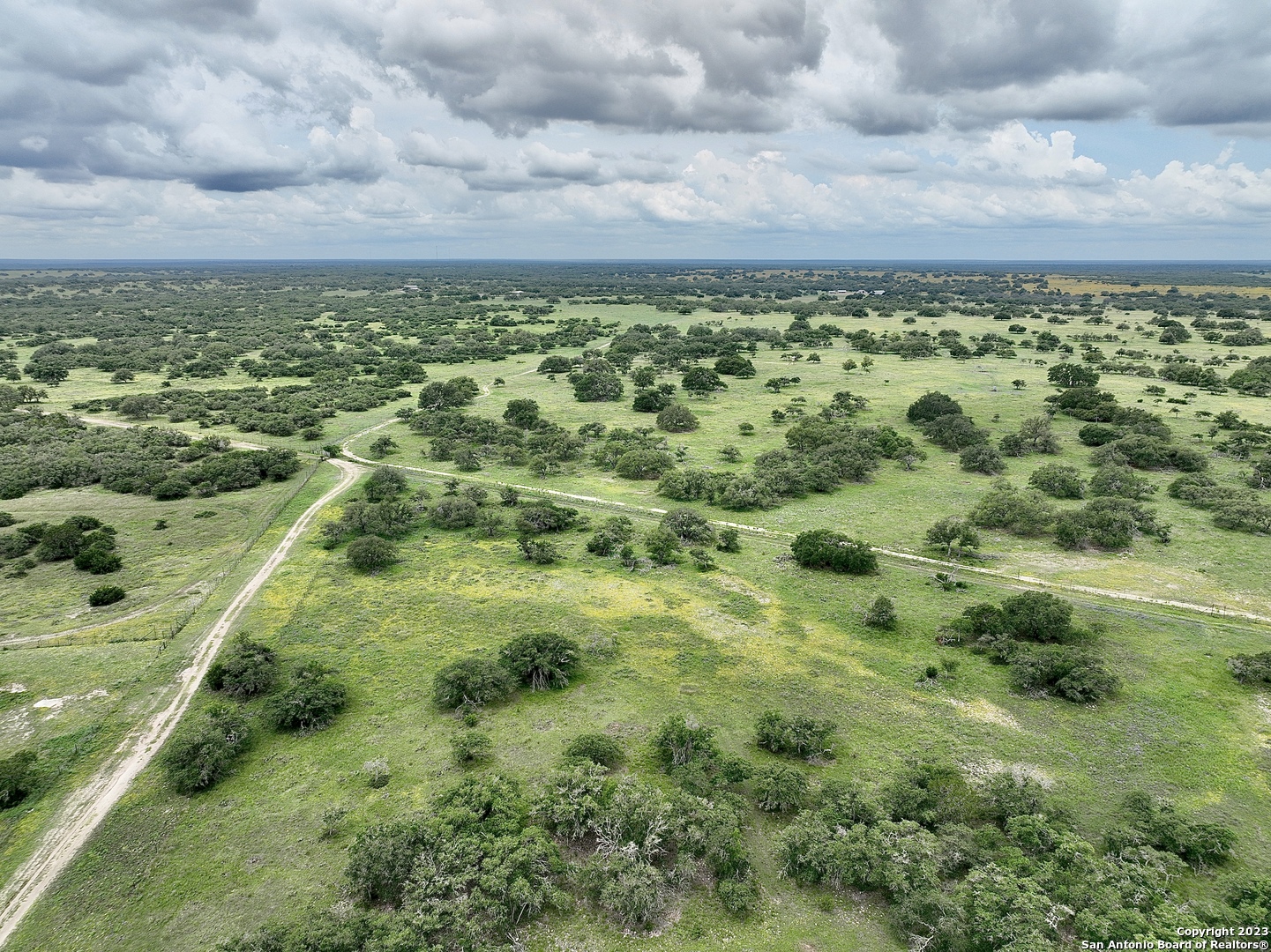 465 Watkins Road Mountain Home, TX 78058 - Photo 11 of 56 a view of a green field