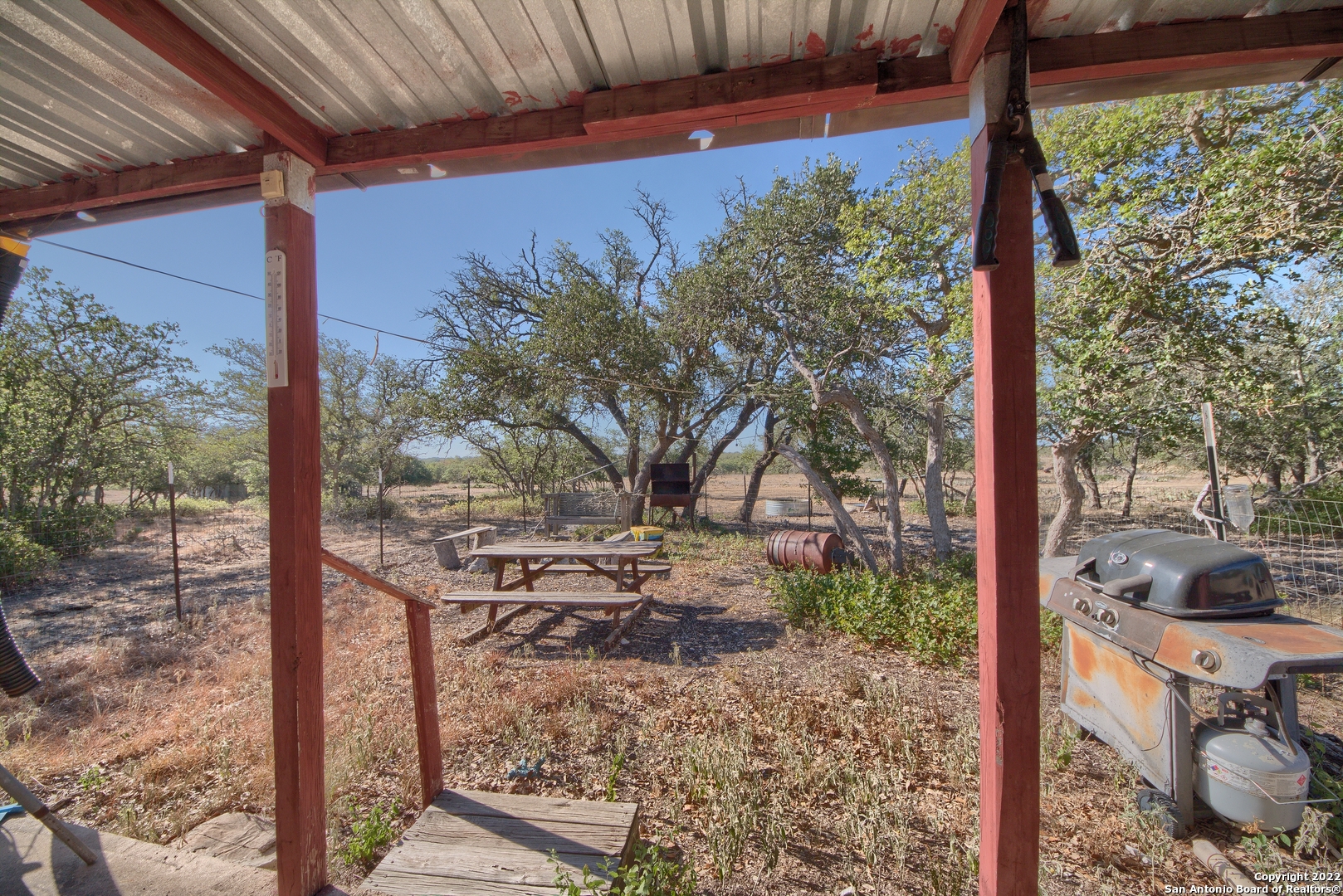 465 Watkins Road Mountain Home, TX 78058 - Photo 13 of 56 a view of a porch with furniture