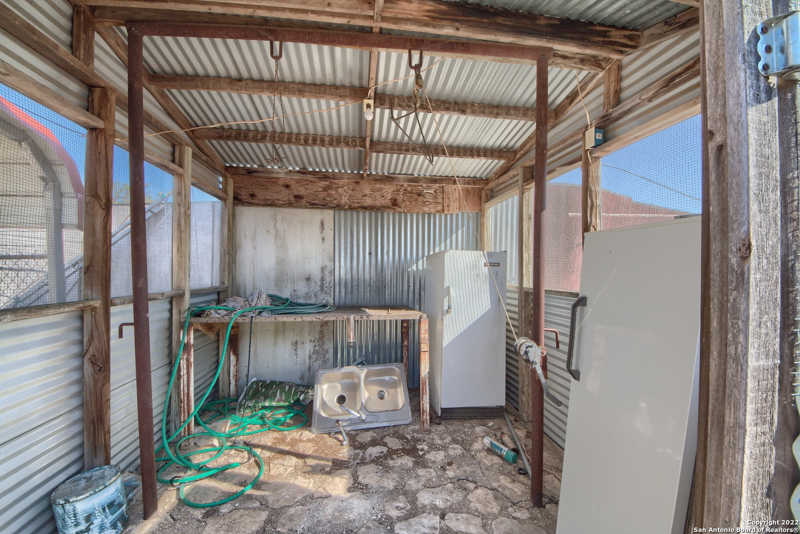 465 Watkins Road Mountain Home, TX 78058 - Photo 34 of 56 a room with water heater and a shower