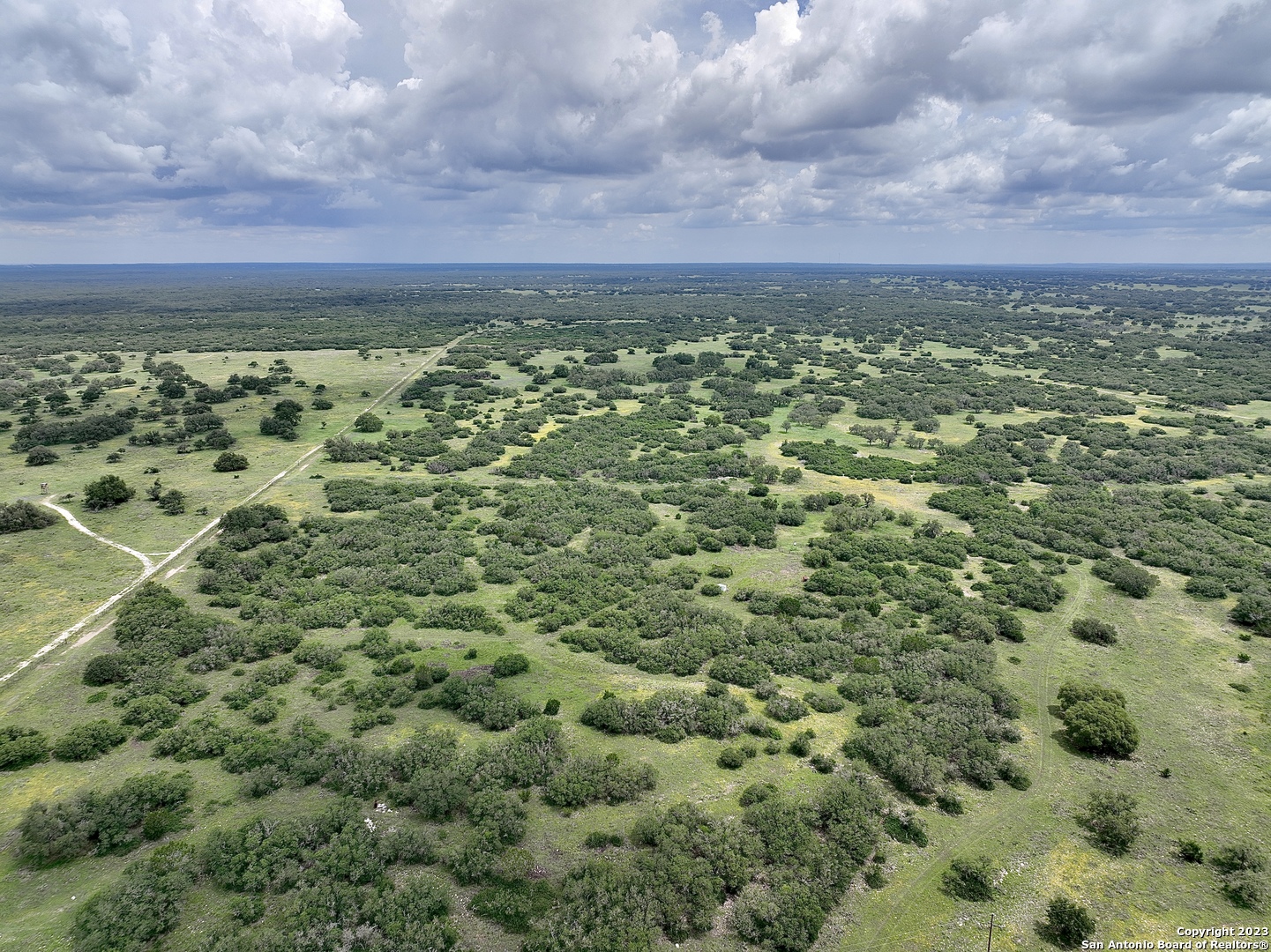 465 Watkins Road Mountain Home, TX 78058 - Photo 9 of 56 a view of a field with an ocean