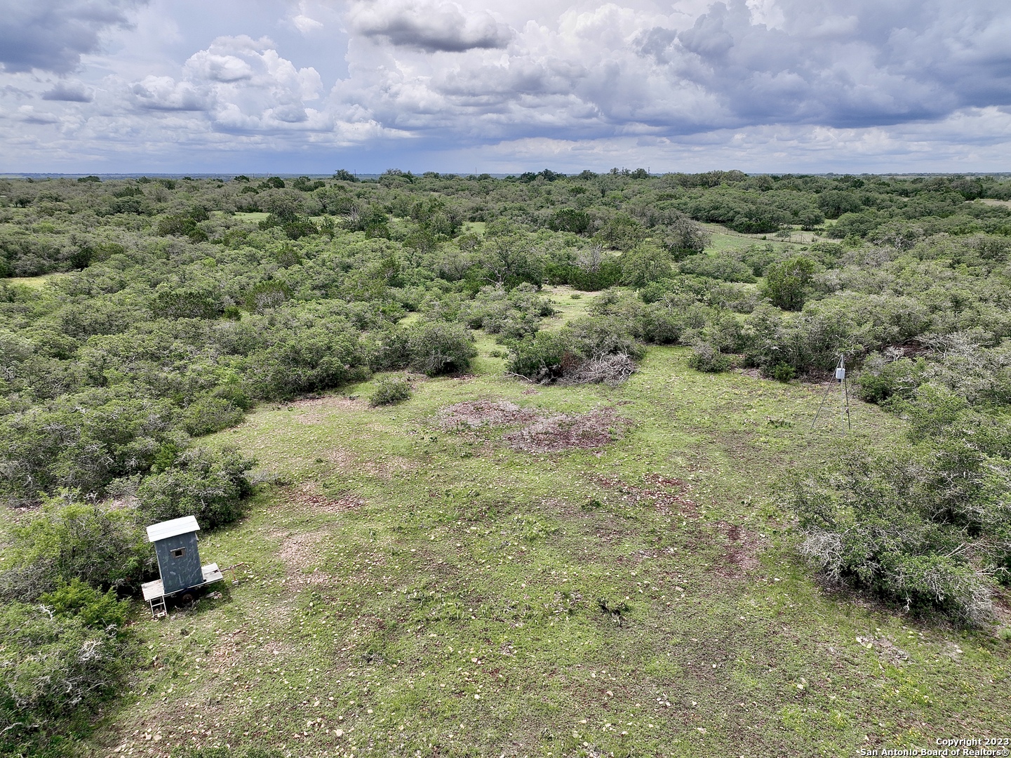 465 Watkins Road Mountain Home, TX 78058 - Photo 10 of 56 a view of a green field