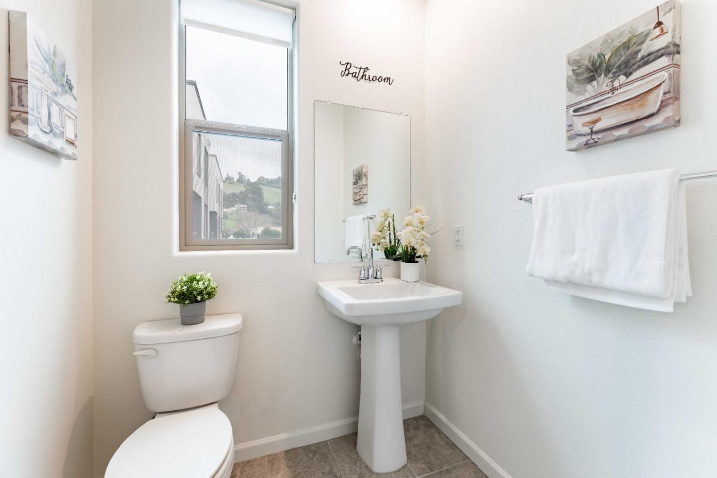 25353 Custom Drive Hayward, CA 94544 - Photo 15 of 32 a bathroom with a toilet sink and mirror