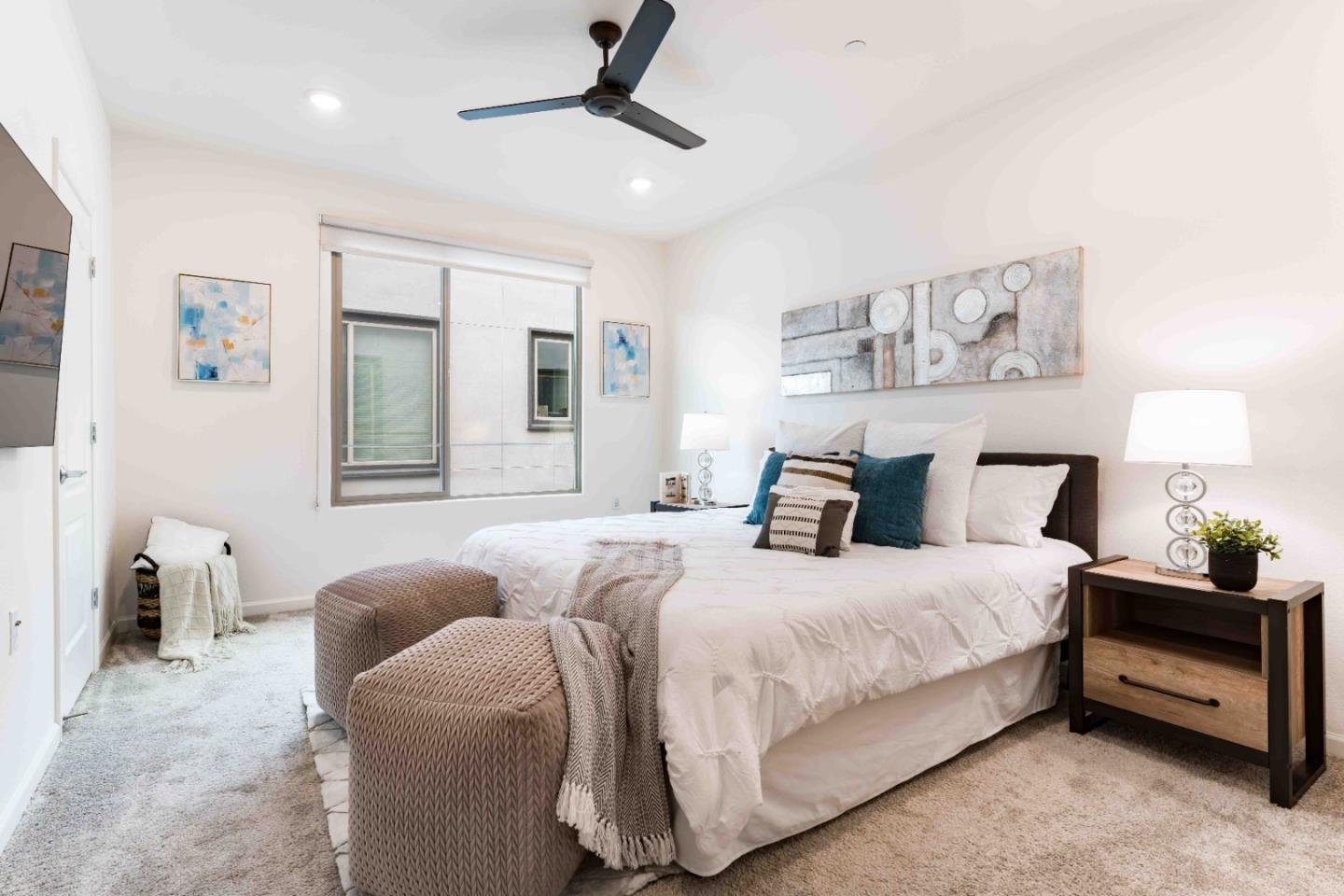 25353 Custom Drive Hayward, CA 94544 - Photo 17 of 32 a bedroom with a bed and a night stand