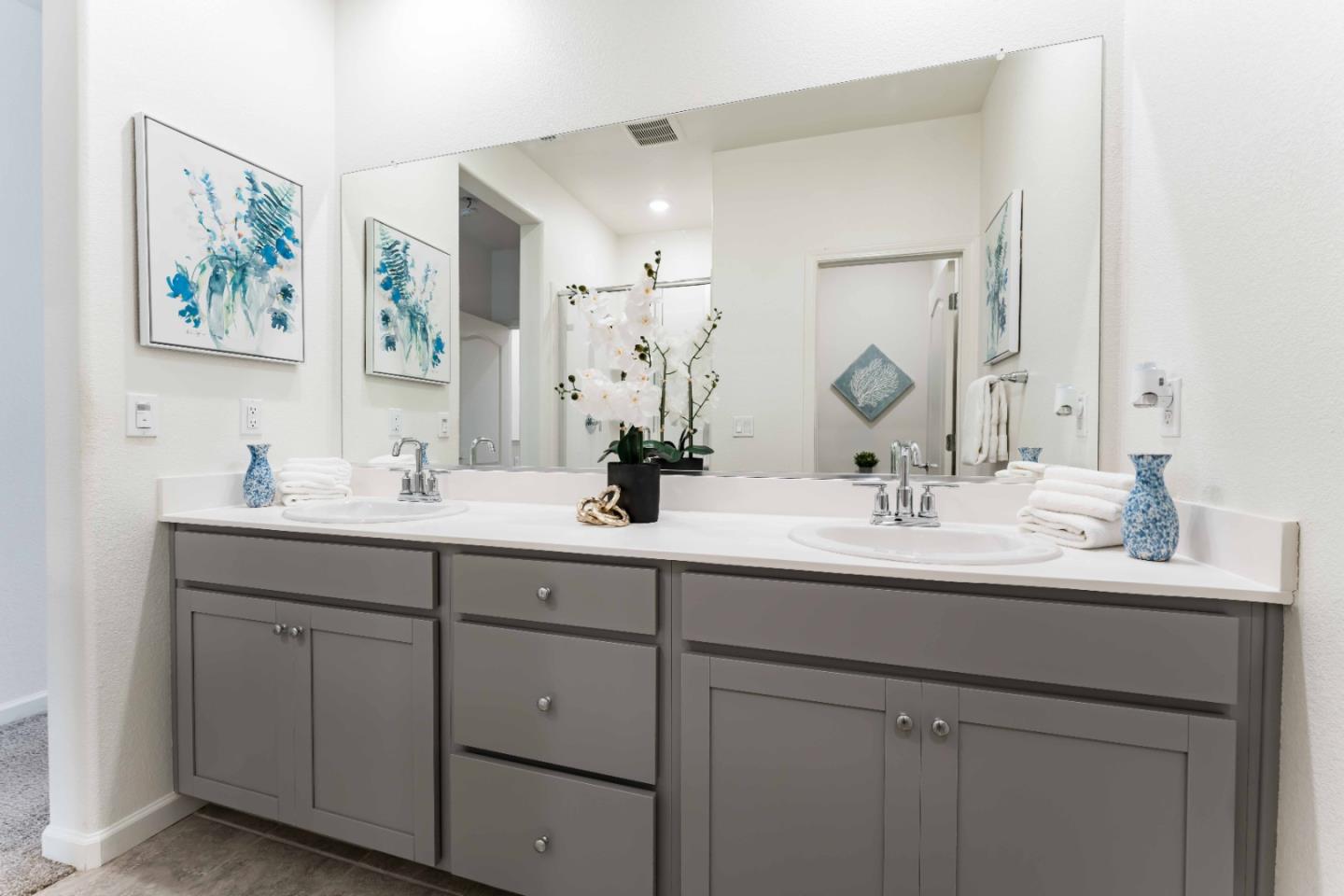 25353 Custom Drive Hayward, CA 94544 - Photo 20 of 32 a bathroom with double sink and a mirror