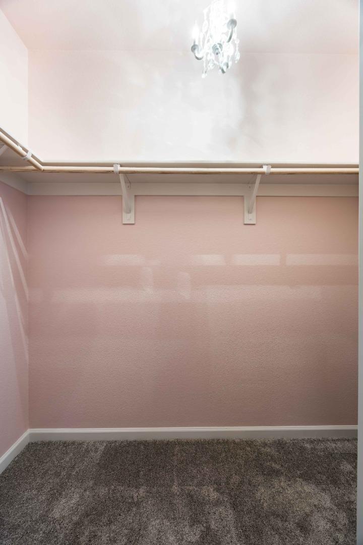 25353 Custom Drive Hayward, CA 94544 - Photo 22 of 32 a view of small space with racks on the wall