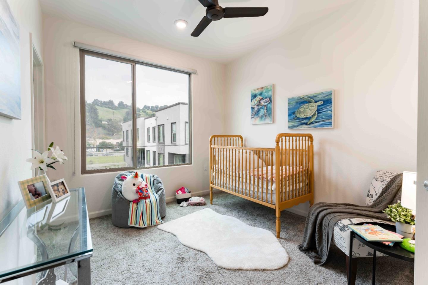 25353 Custom Drive Hayward, CA 94544 - Photo 24 of 32 a bedroom with a bed and a window