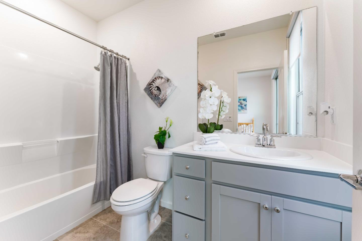 25353 Custom Drive Hayward, CA 94544 - Photo 25 of 32 a bathroom with a sink toilet and shower