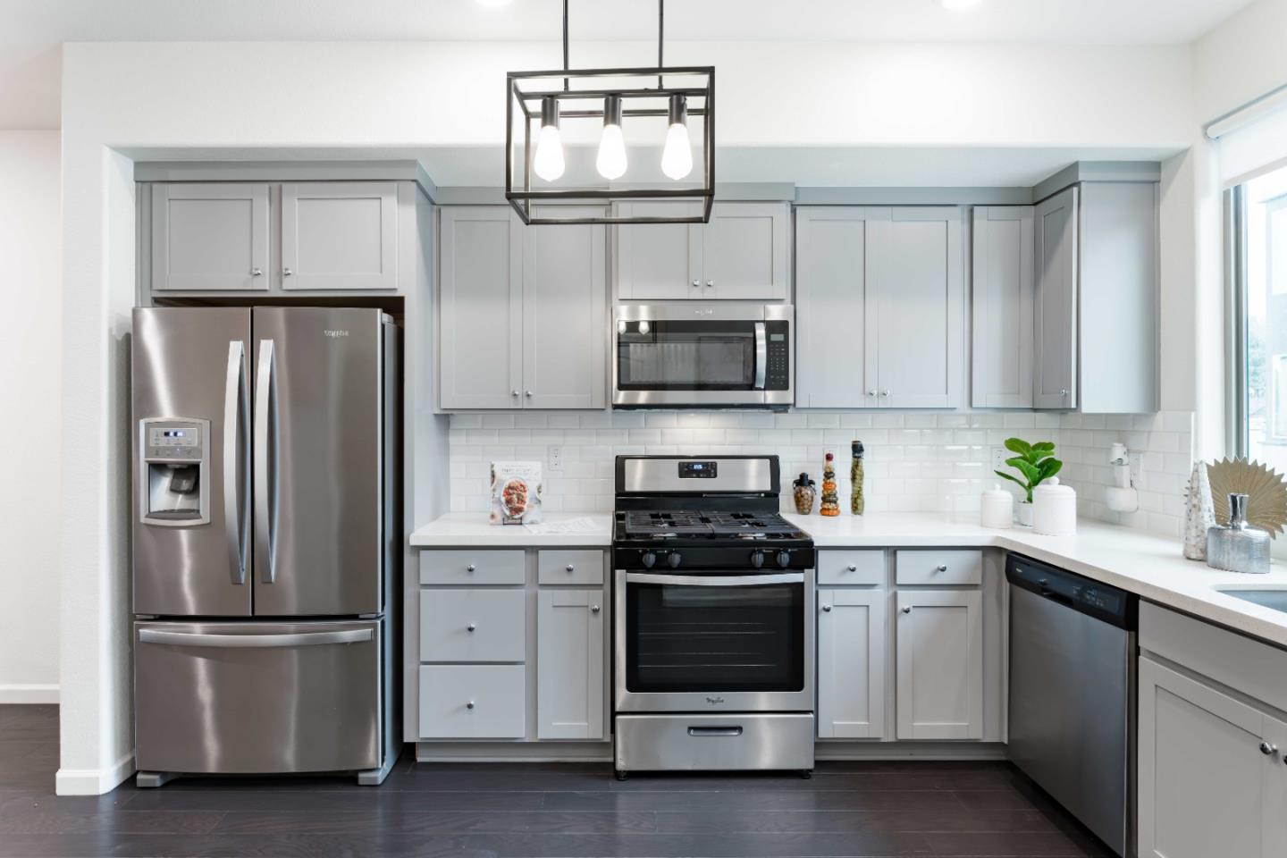 25353 Custom Drive Hayward, CA 94544 - Photo 3 of 32 a kitchen with cabinets stainless steel appliances and a counter space