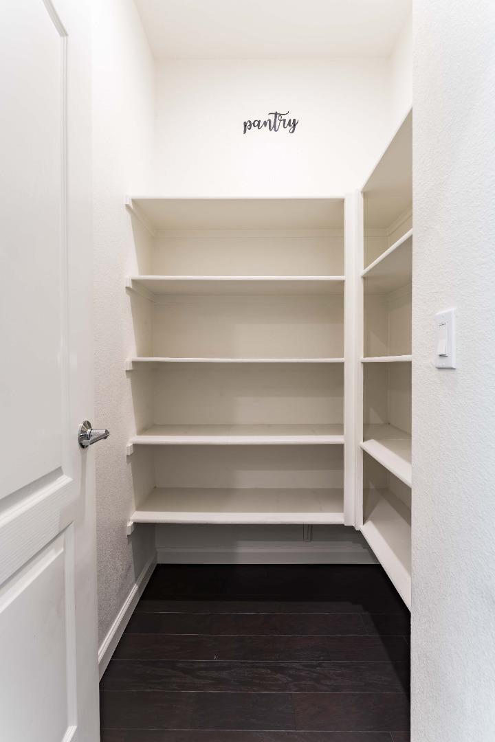25353 Custom Drive Hayward, CA 94544 - Photo 8 of 32 a view of walk in closet with empty racks