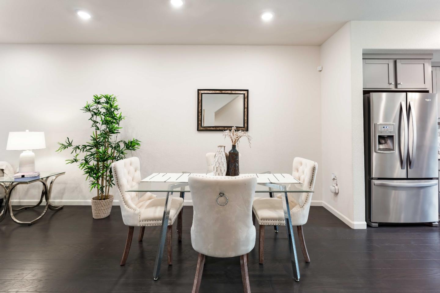 25353 Custom Drive Hayward, CA 94544 - Photo 10 of 32 a view of a dining room with furniture and wooden floor