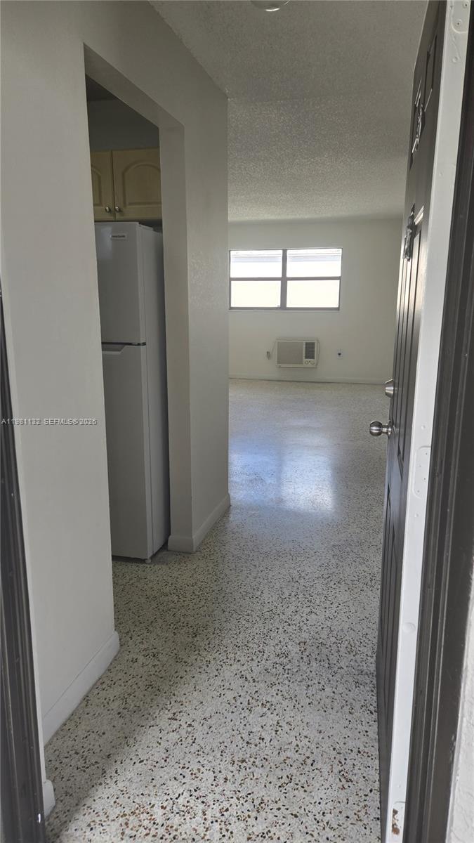 142 Southwest 18th Avenue, Unit 30 Miami, FL 33135 - Photo 1 of 11 an empty room with windows and closet