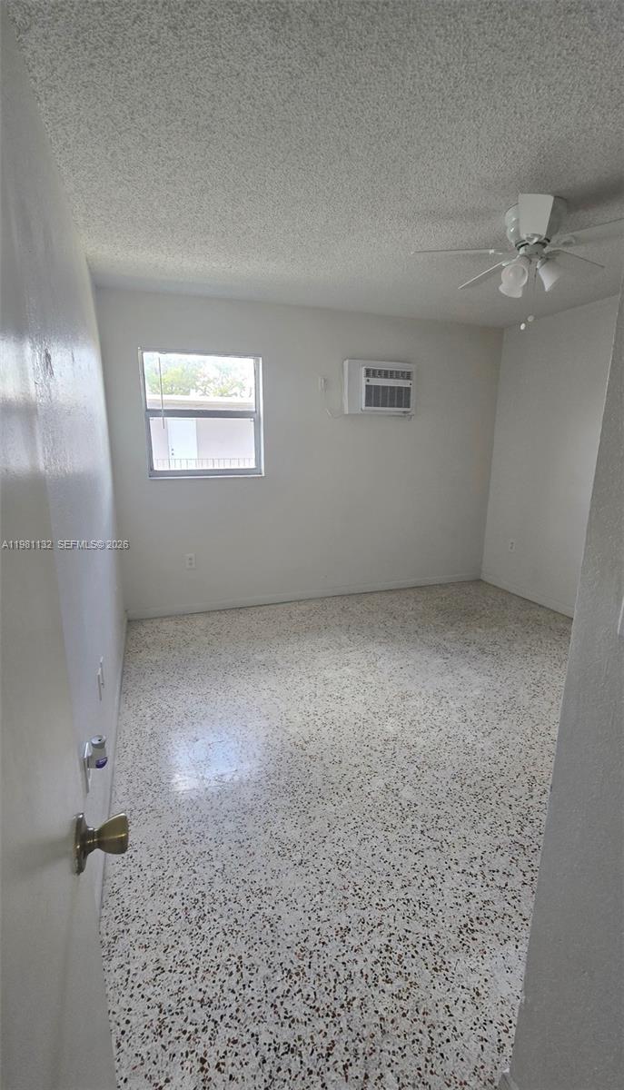 142 Southwest 18th Avenue, Unit 30 Miami, FL 33135 - Photo 6 of 11 an empty room with windows