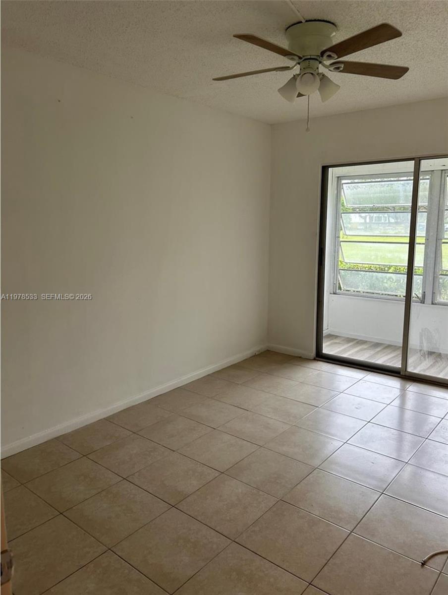 550 Mansfield M, Unit 550 Boca Raton, FL 33434 - Photo 25 of 30 a view of an empty room and window