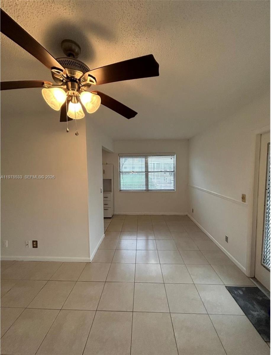 550 Mansfield M, Unit 550 Boca Raton, FL 33434 - Photo 28 of 30 a view of an empty room with a window