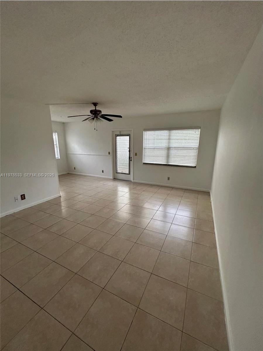 550 Mansfield M, Unit 550 Boca Raton, FL 33434 - Photo 4 of 30 a view of an empty room and window