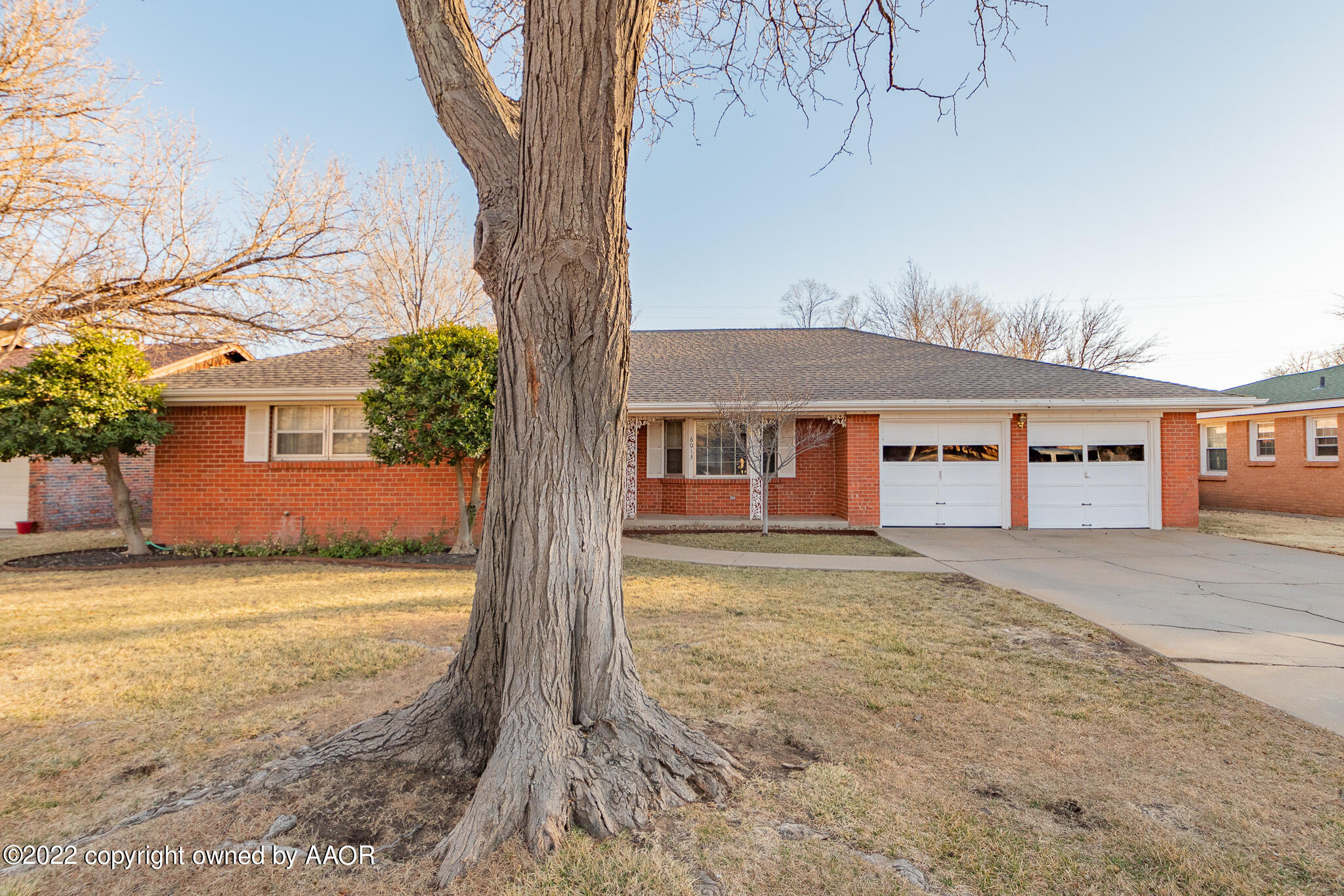 6013 Calumet Road Amarillo, TX 79106 - Photo 2 of 26 front view of a house with a yard