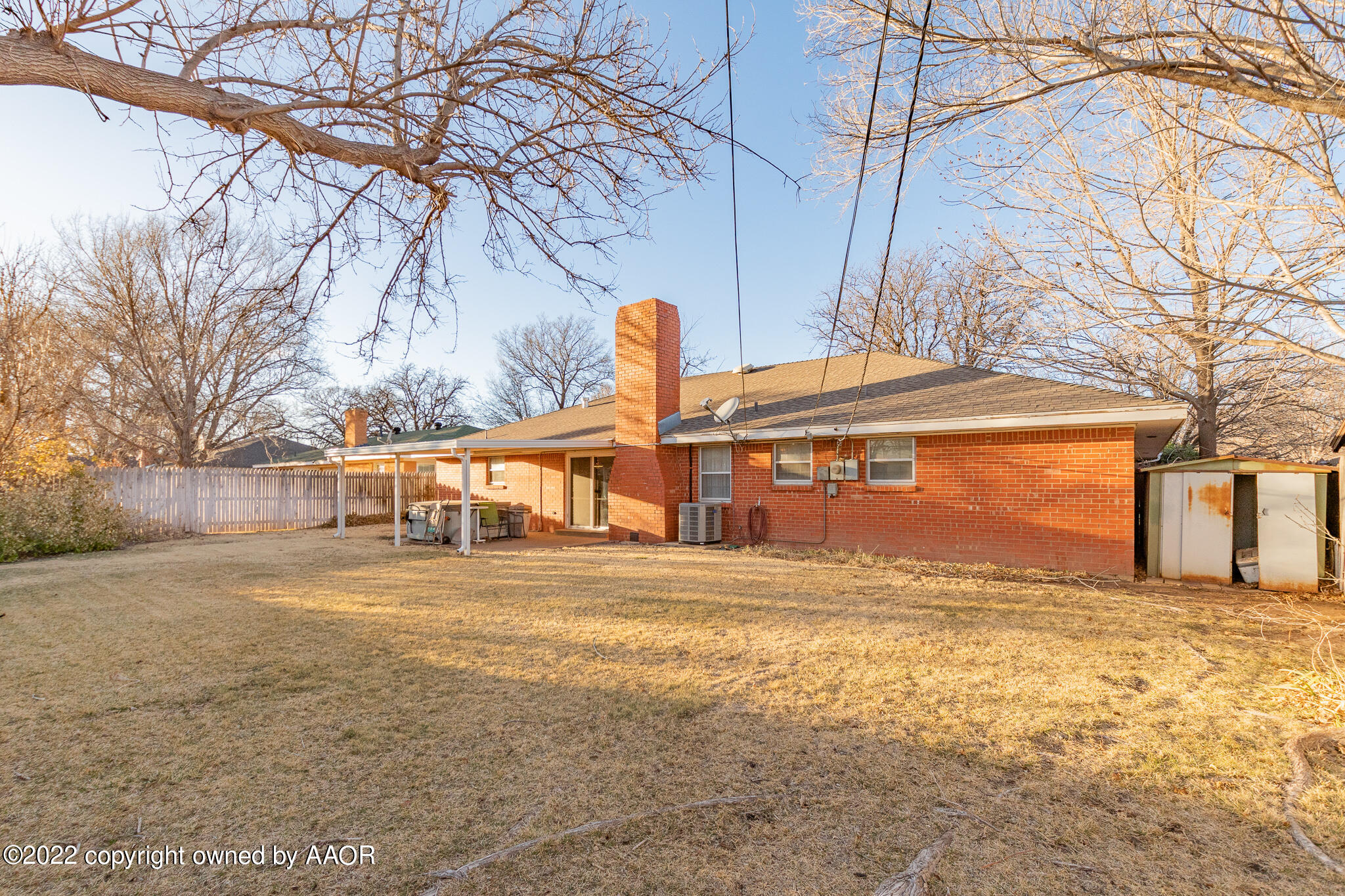 6013 Calumet Road Amarillo, TX 79106 - Photo 24 of 26 a front view of house with yard
