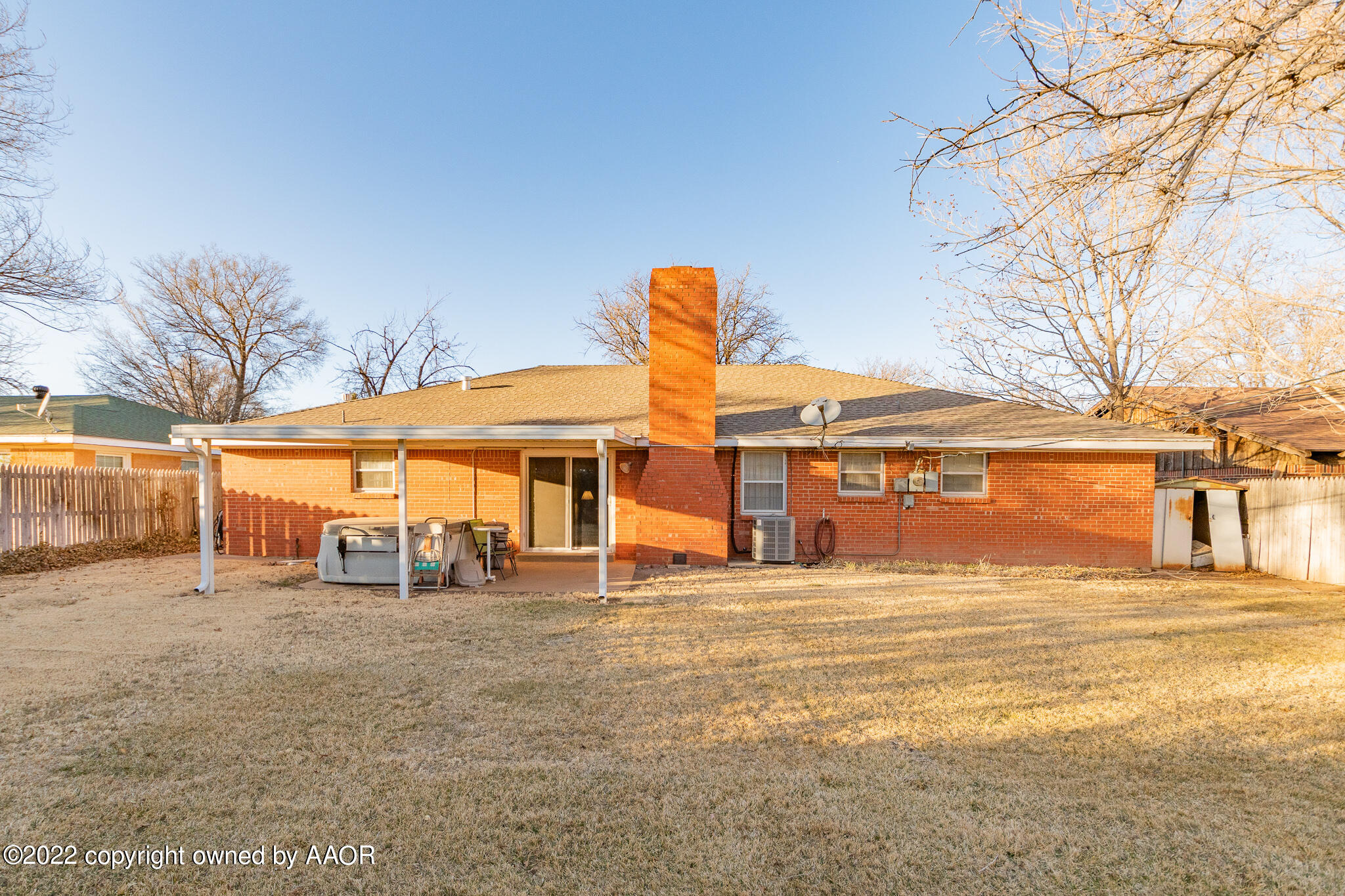 6013 Calumet Road Amarillo, TX 79106 - Photo 26 of 26 a large building with trees in front of it