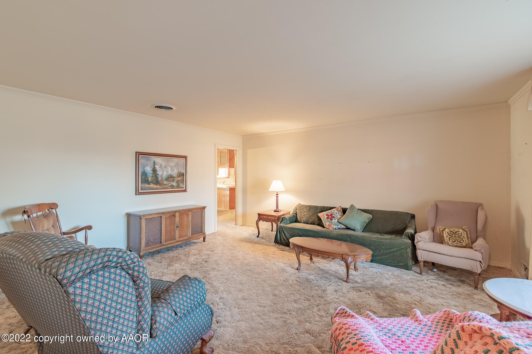 6013 Calumet Road Amarillo, TX 79106 - Photo 5 of 26 a living room with furniture and a couch