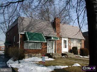 423 W Road Ridley Park, PA 19078 - Photo 1 of 1 a front view of a house with a yard