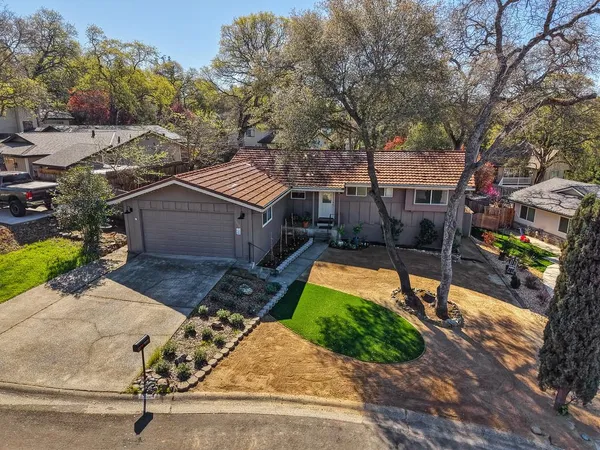 a view of a backyard with a patio