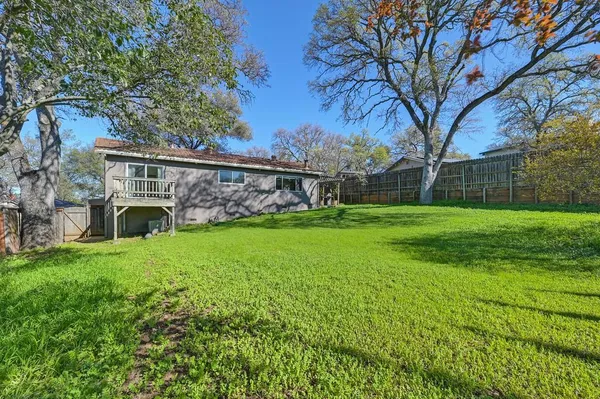 a view of a backyard with a garden