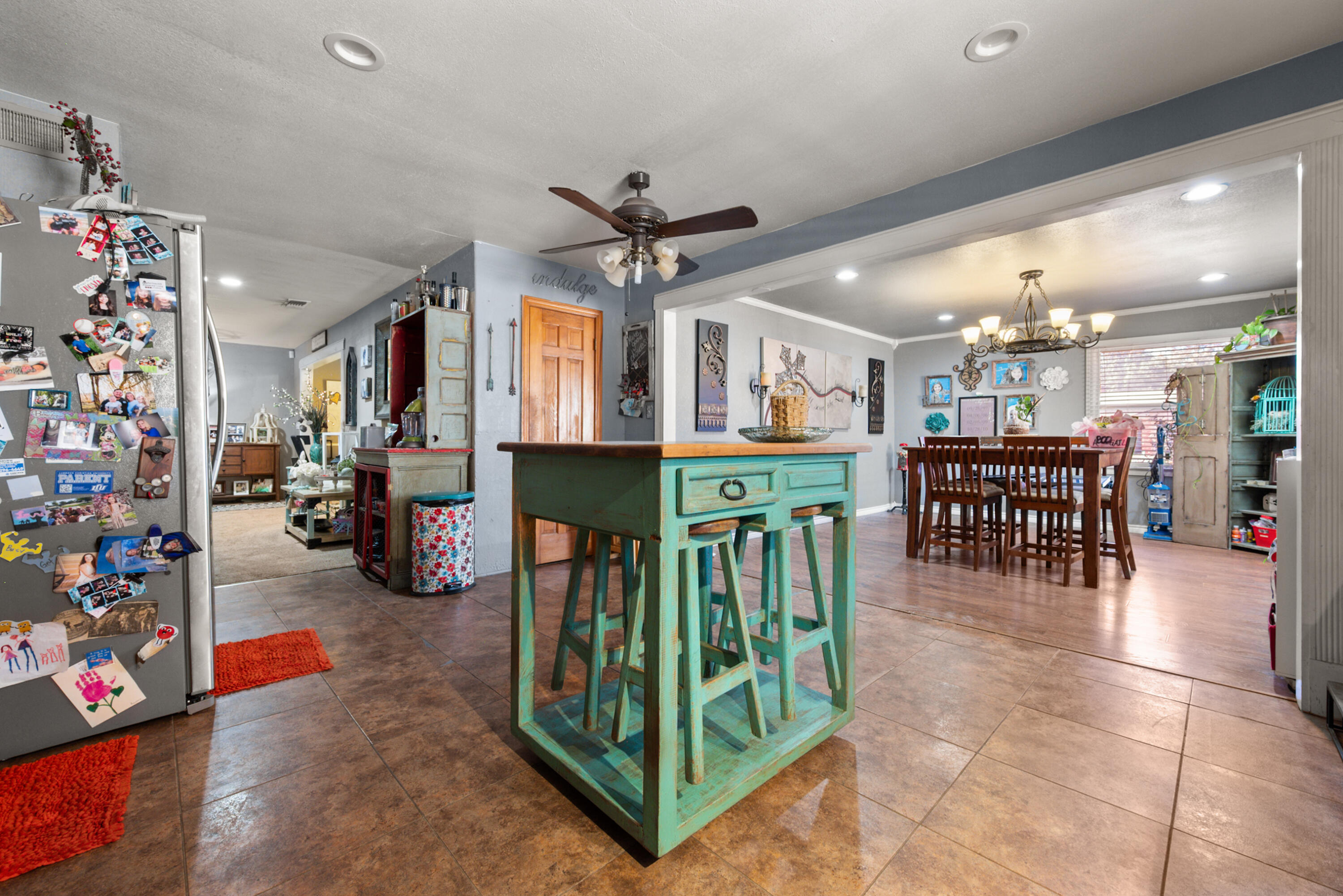 1204 Garland Plainview, TX 79072 - Photo 15 of 29 a view of a dining room with furniture and a chandelier