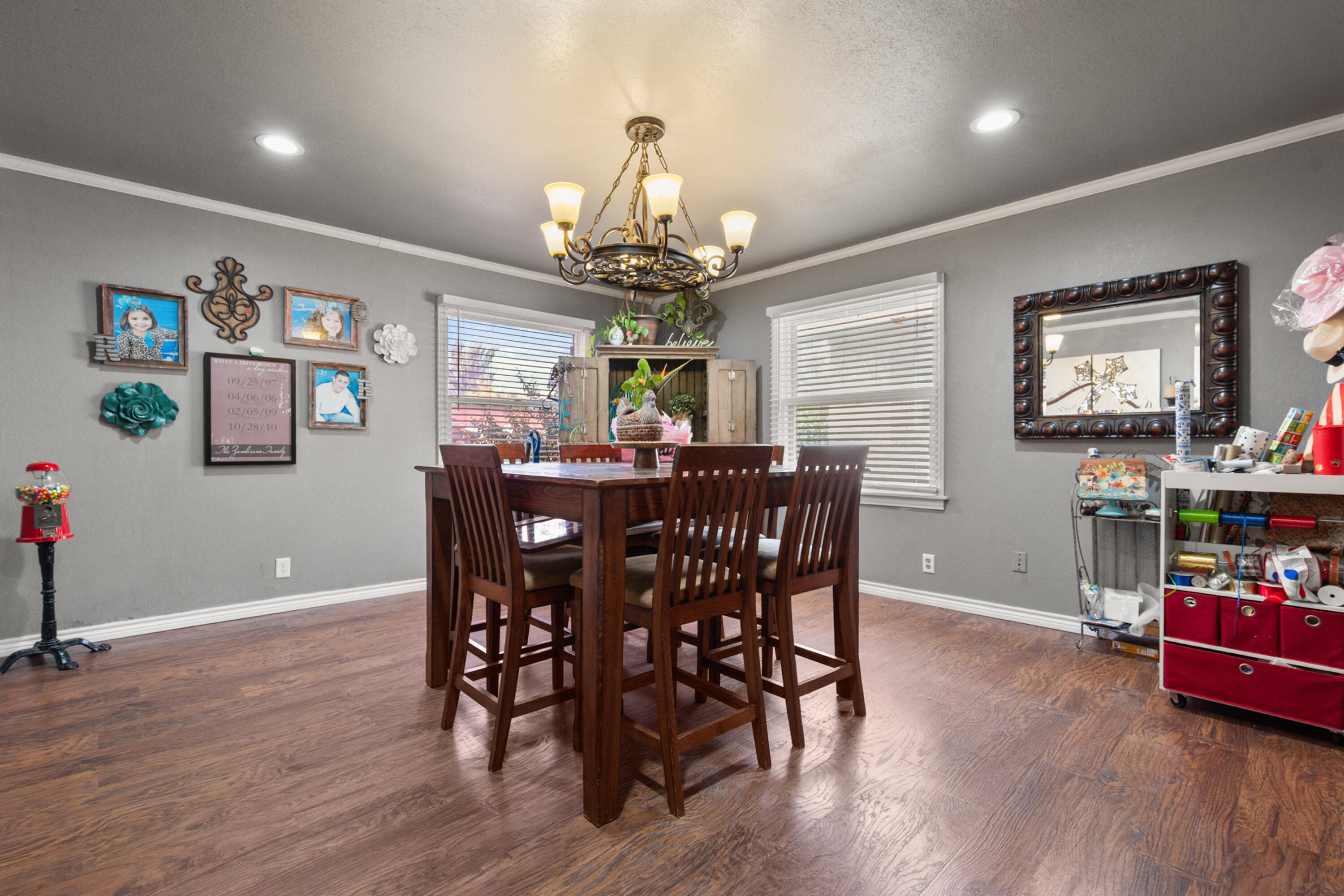 1204 Garland Plainview, TX 79072 - Photo 17 of 29 a view of a dining room with furniture wooden floor and chandelier