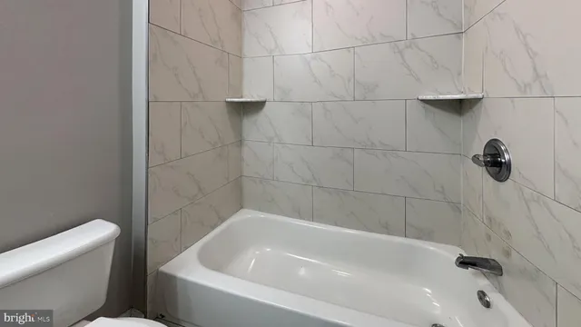 a bathroom with a bathtub