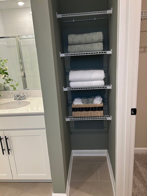 304 Hickory Pointe Drive Dickson, TN 37055 - Photo 25 of 26 a bathroom with a sink and a mirror