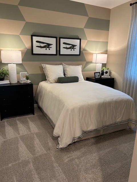 304 Hickory Pointe Drive Dickson, TN 37055 - Photo 7 of 26 a bedroom with a bed and a lamp