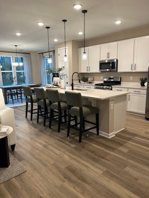 304 Hickory Pointe Drive Dickson, TN 37055 - Photo 8 of 26 a large kitchen with lots of furniture a sink appliances and cabinets