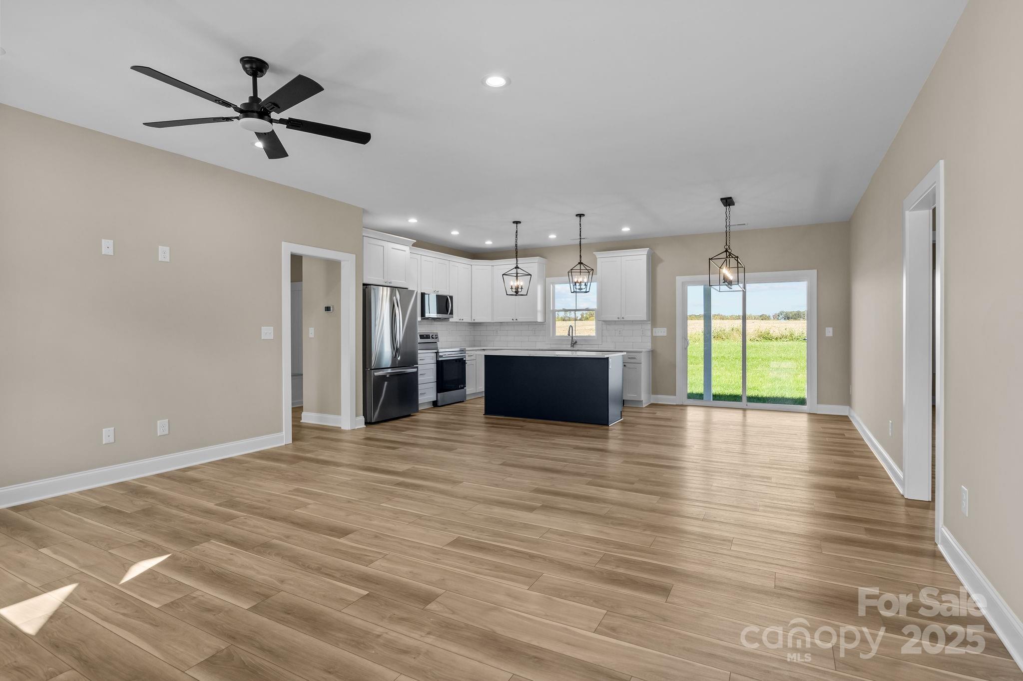 1716 Jennings Road Olin, NC 28660 - Photo 12 of 48 a view of a kitchen with a sink and a window