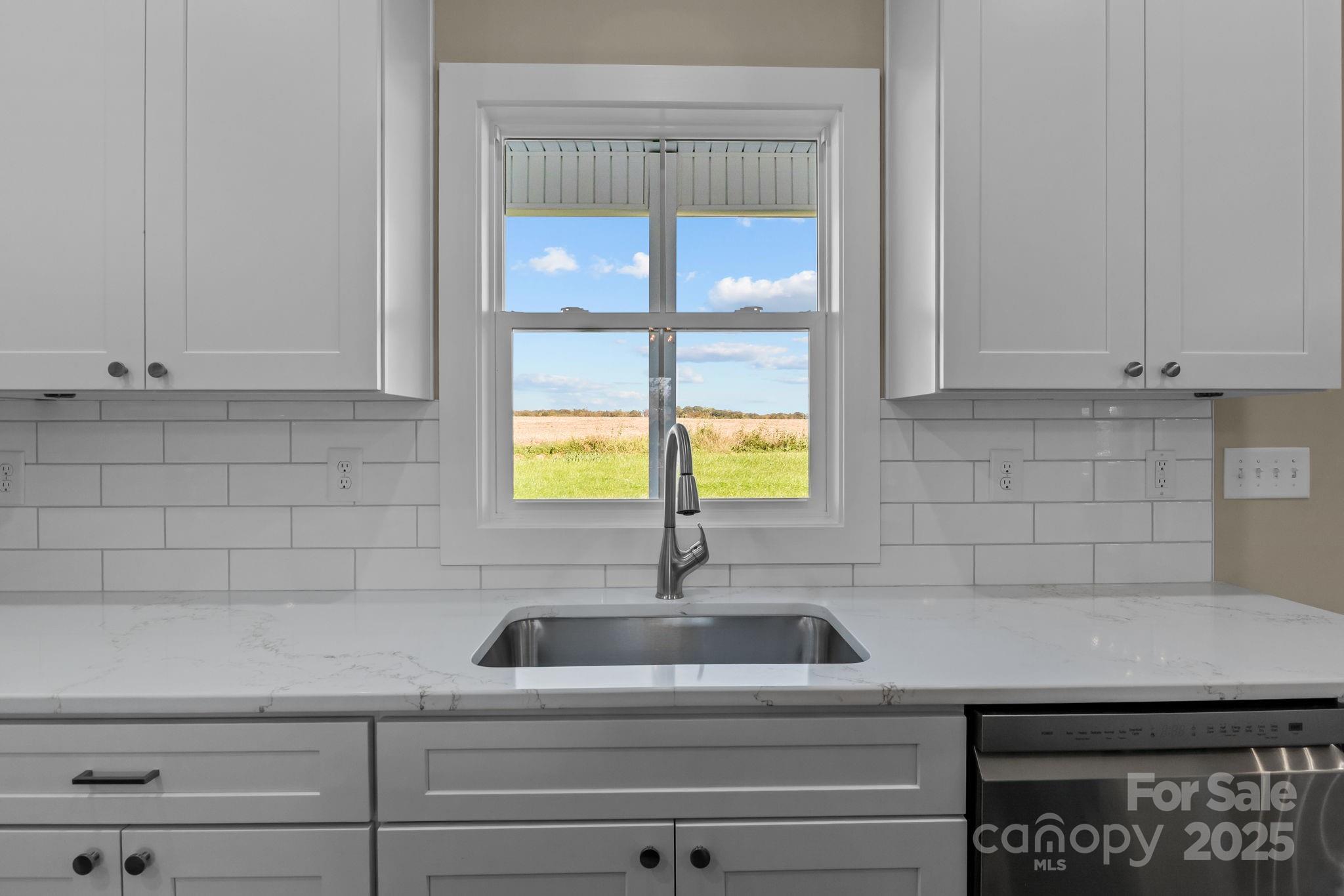 1716 Jennings Road Olin, NC 28660 - Photo 18 of 48 a close view of sink and tap